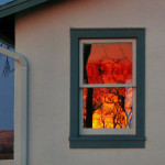 sunrise reflected in the window